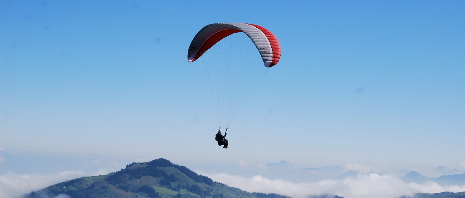 paragliding over the clouds